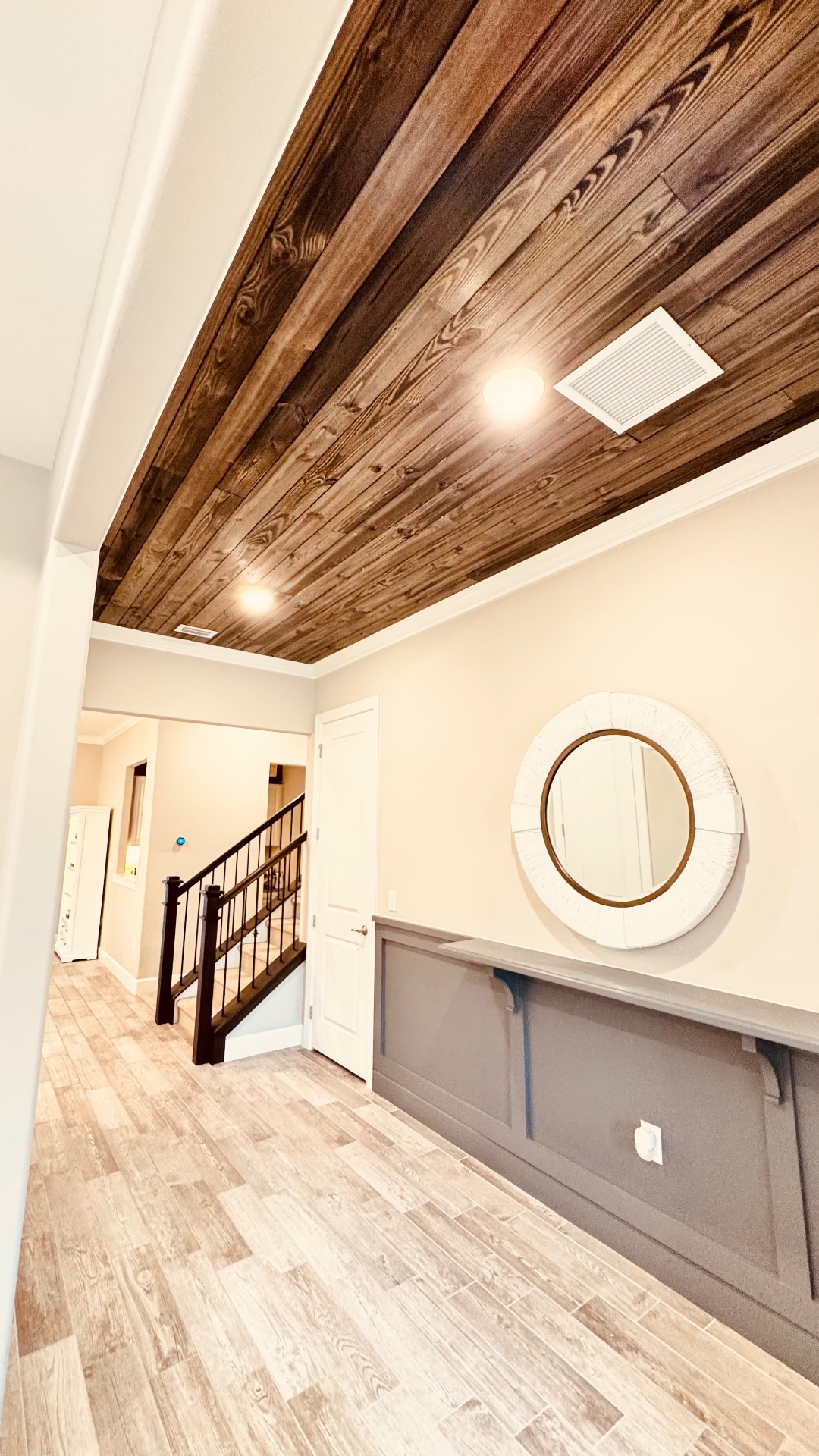 After — Entryway wood plank ceiling
